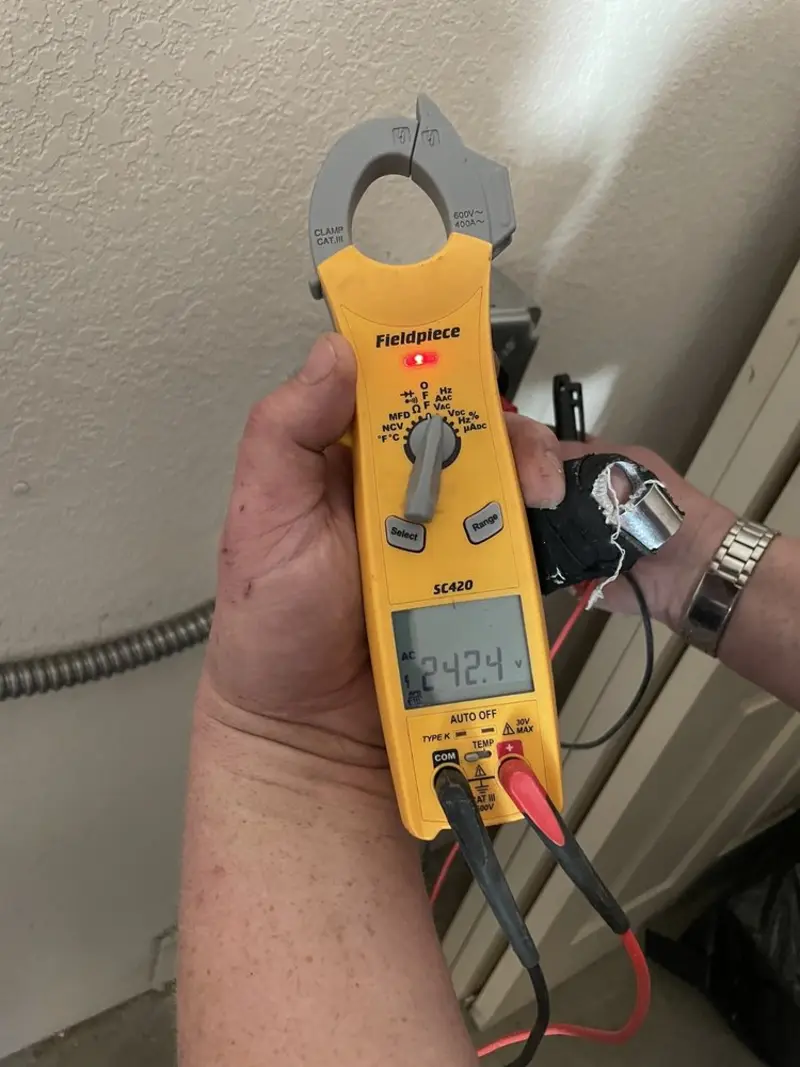 Voltage testing with clamp meter during Generator Installation in Chelan
